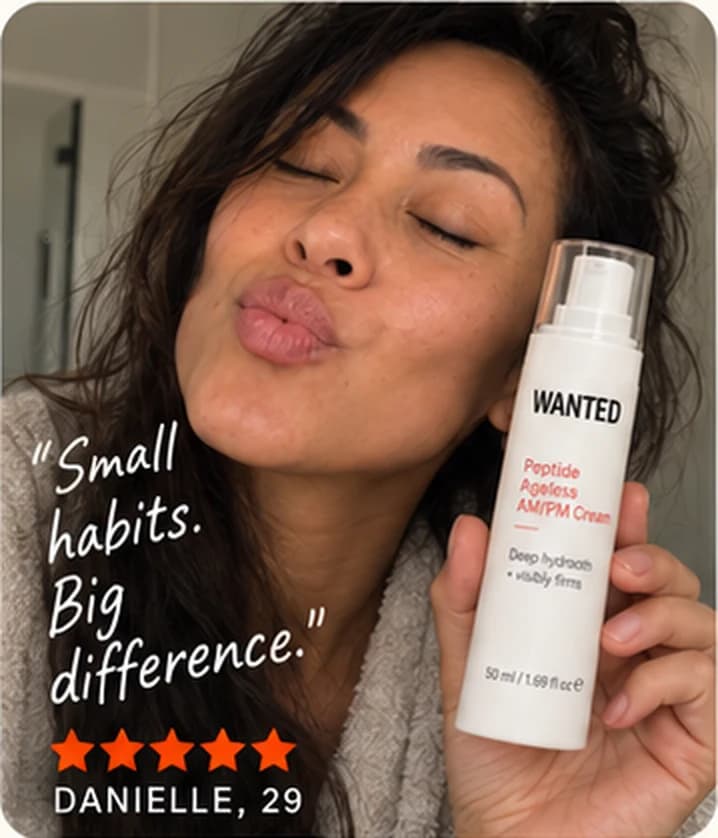 Danielle, 29, playfully puckering with the WANTED Peptide Ageless AM/PM Cream.