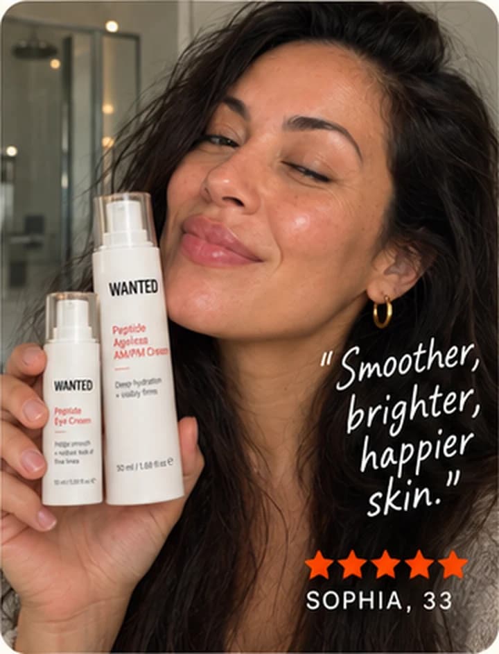 Sophia, 33, holding the WANTED Peptide Eye Cream and AM/PM Cream beside her face.